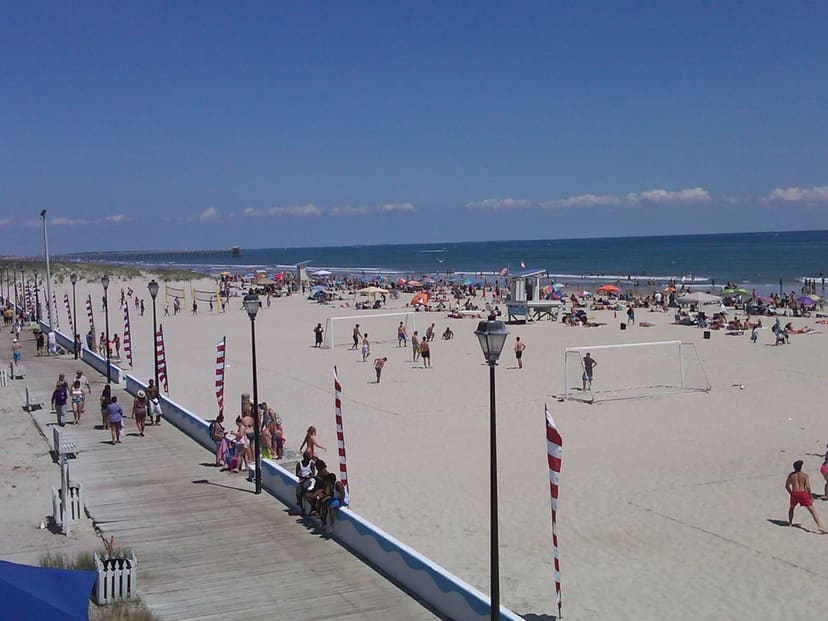 Wide sandy beach and oceanfront access at The Circle