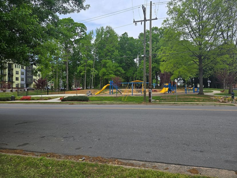 Playgrounds, basketball court, and paths at Tryon Hills Park in Charlotte