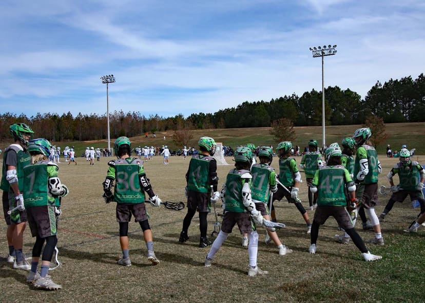Youth lacrosse teams using a multipurpose field at Mazeppa Park