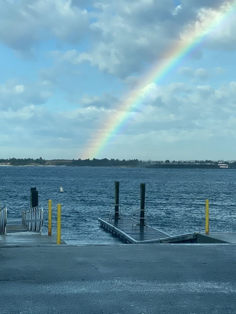 Boat ramp and rainbow over the Newport River access on Radio Island