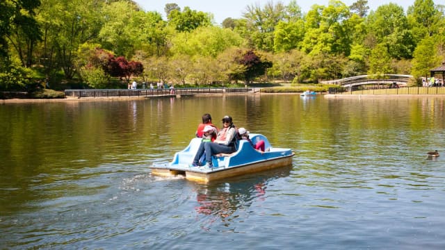 Family using a Pullen Park pedal boat before the Lake Howell project