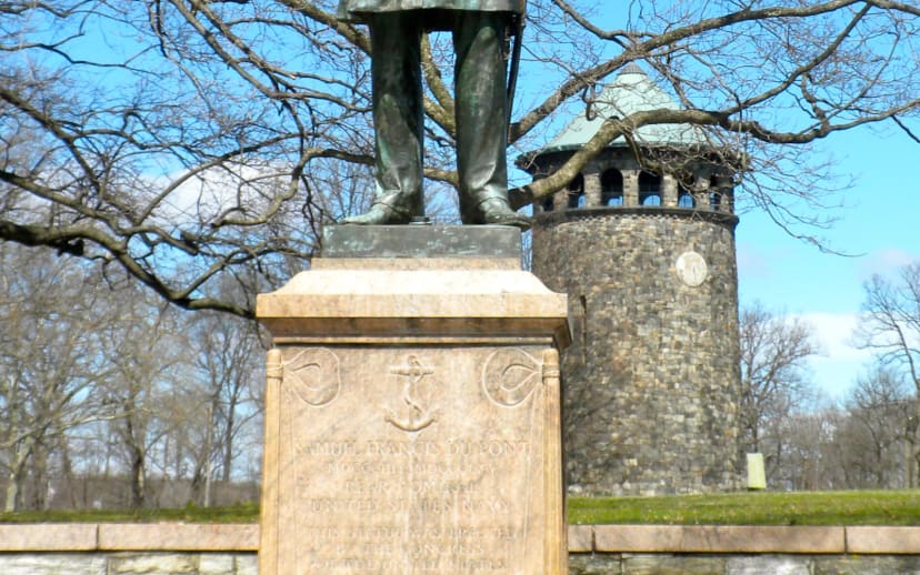 Samuel Francis Du Pont statue with Rockford Tower behind it