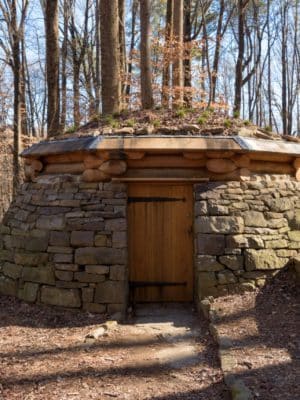 Stone and turf exterior of Cloud Chamber for the Trees and Sky