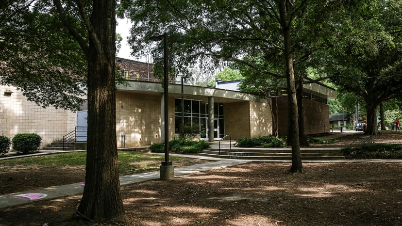 Roberts Park Community Center beneath mature shade trees